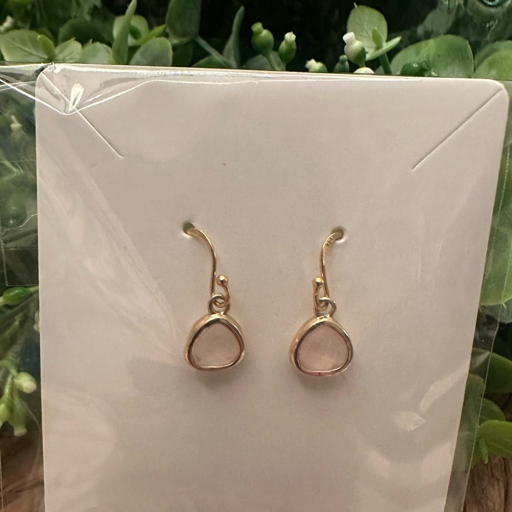 Gold drop earrings with light pink stone accent